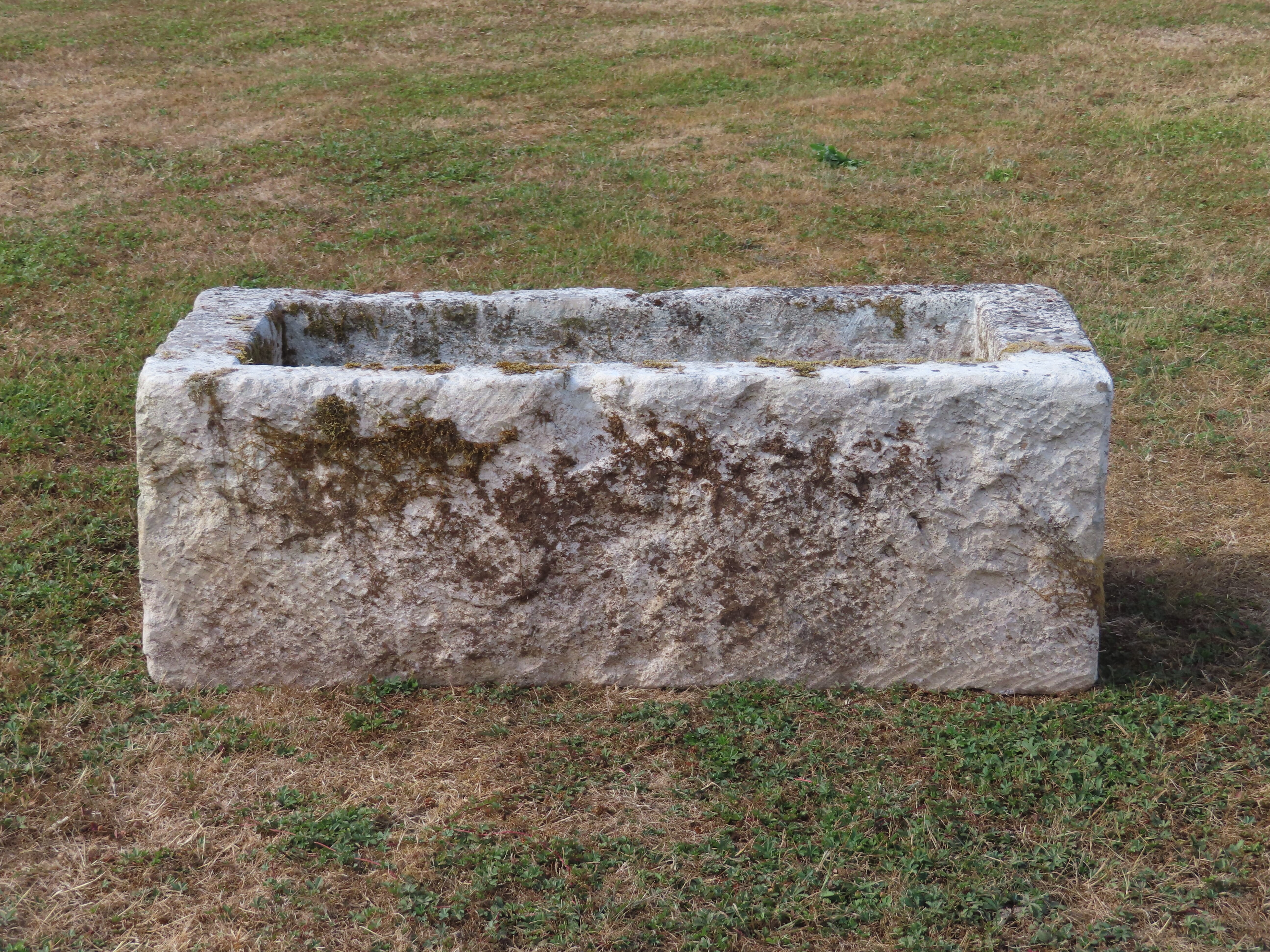 old-stone-trough-holds-water